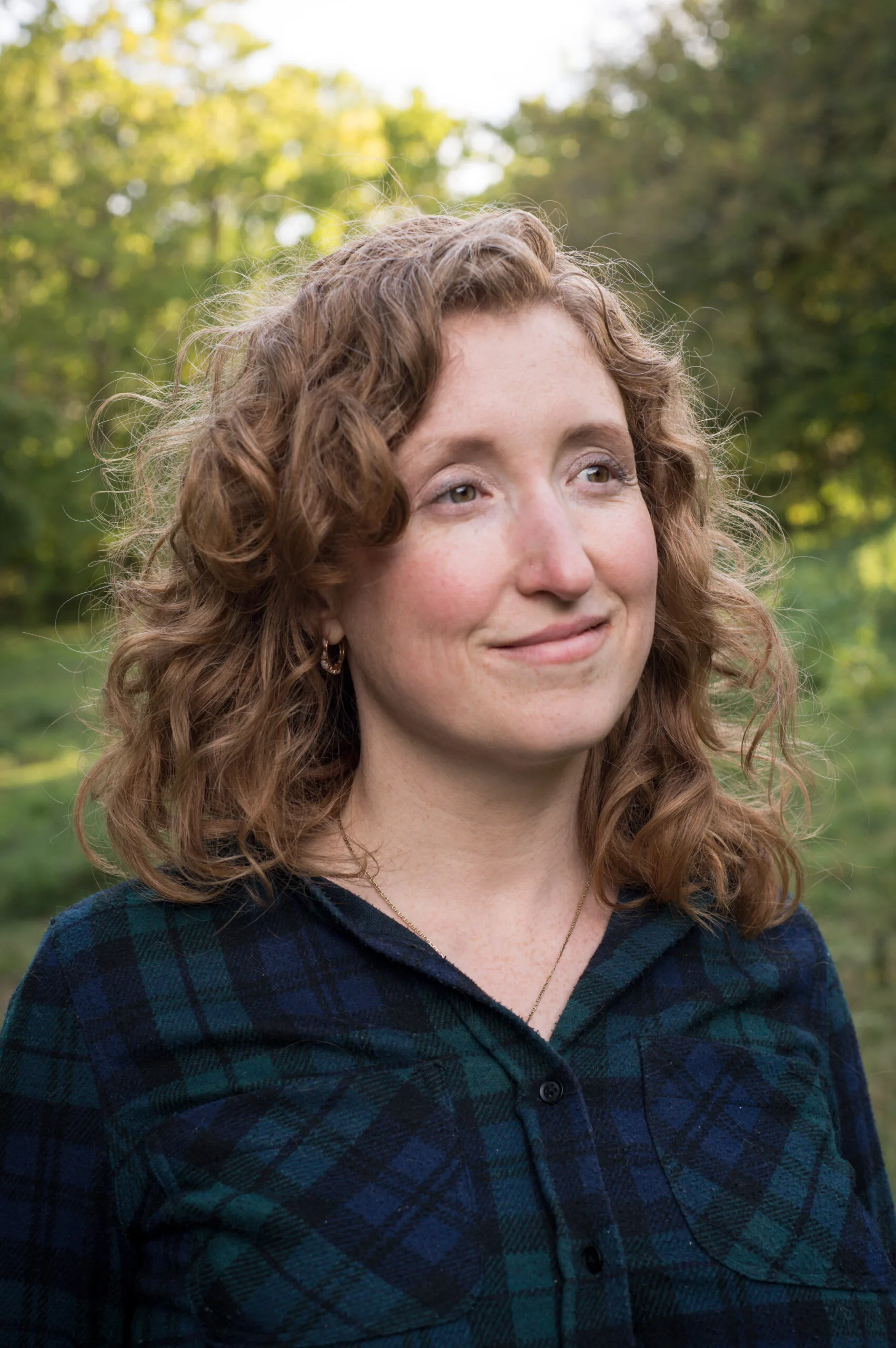 Color photo of woman looking to the side